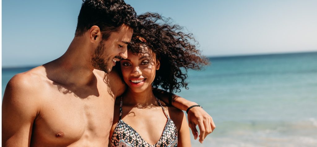 couple walking on beach together picture id1065465078